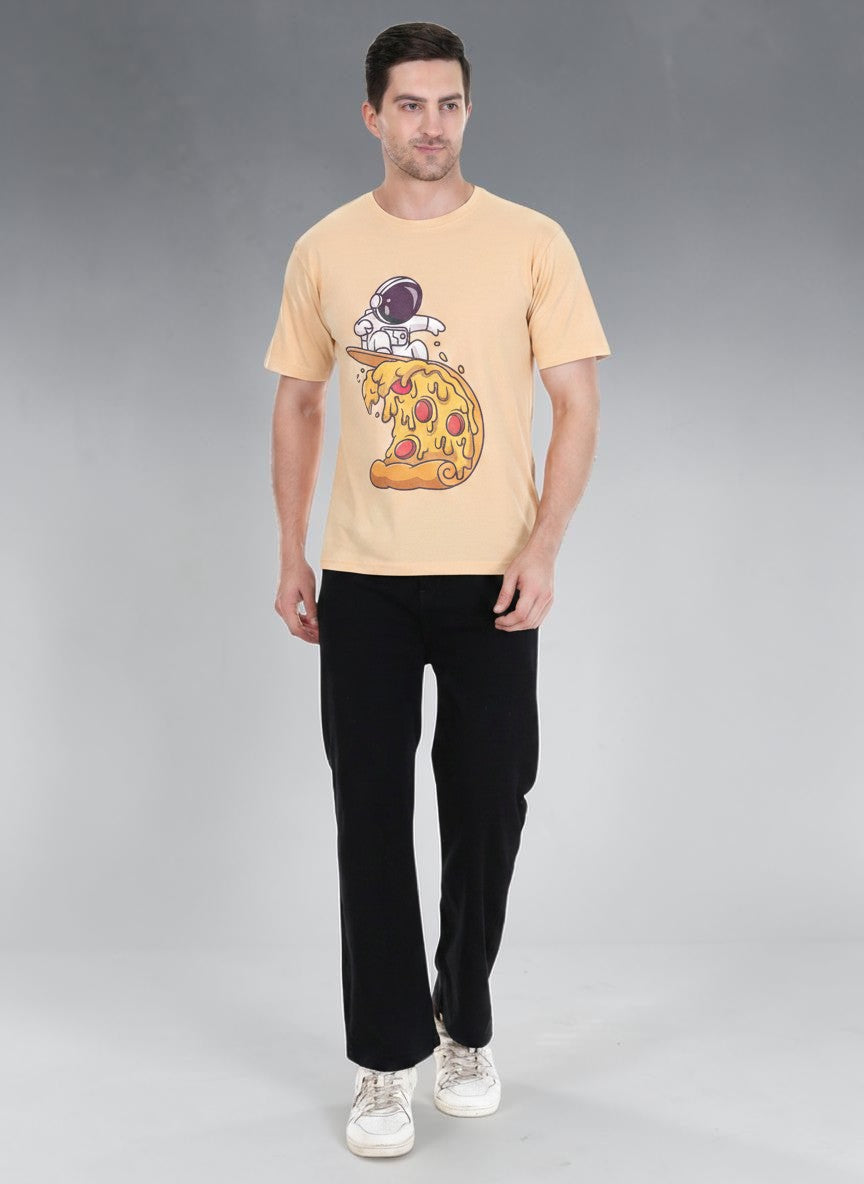 Model wearing an enaay.com light beige cotton t-shirt featuring a playful astronaut surfing a pizza slice graphic.