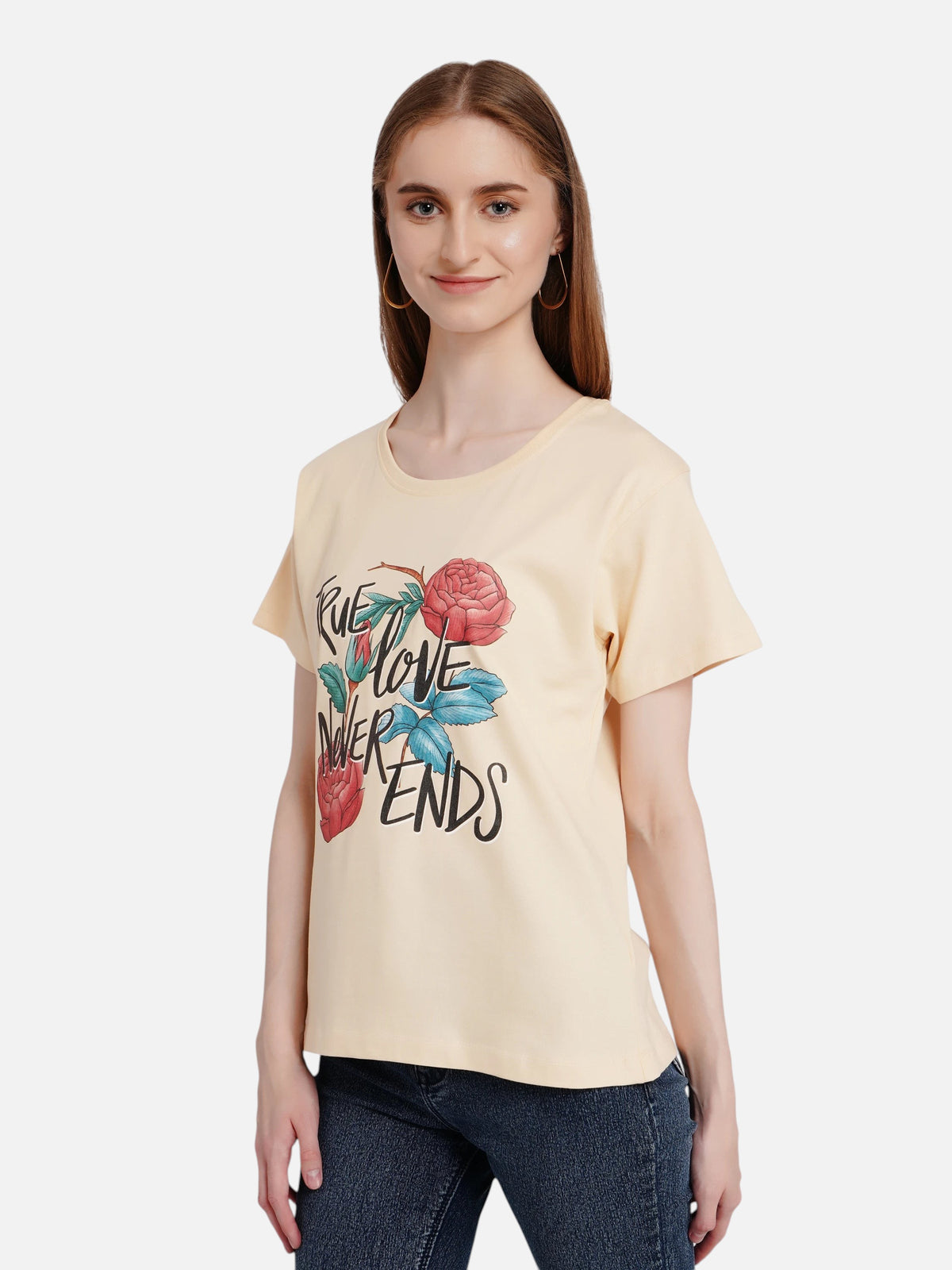 Model wearing an enaay.com beige crew-neck cotton t-shirt with True Love Never Ends floral graphic print