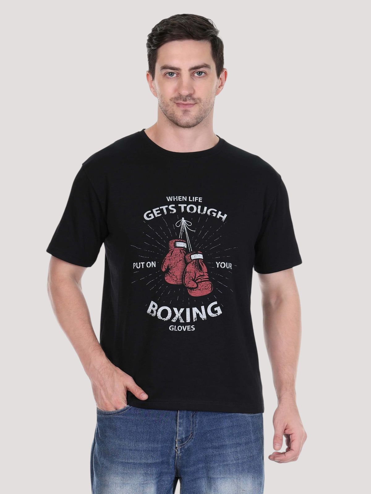 Model wearing an enaay.com black cotton t-shirt with red boxing gloves graphic and motivational text