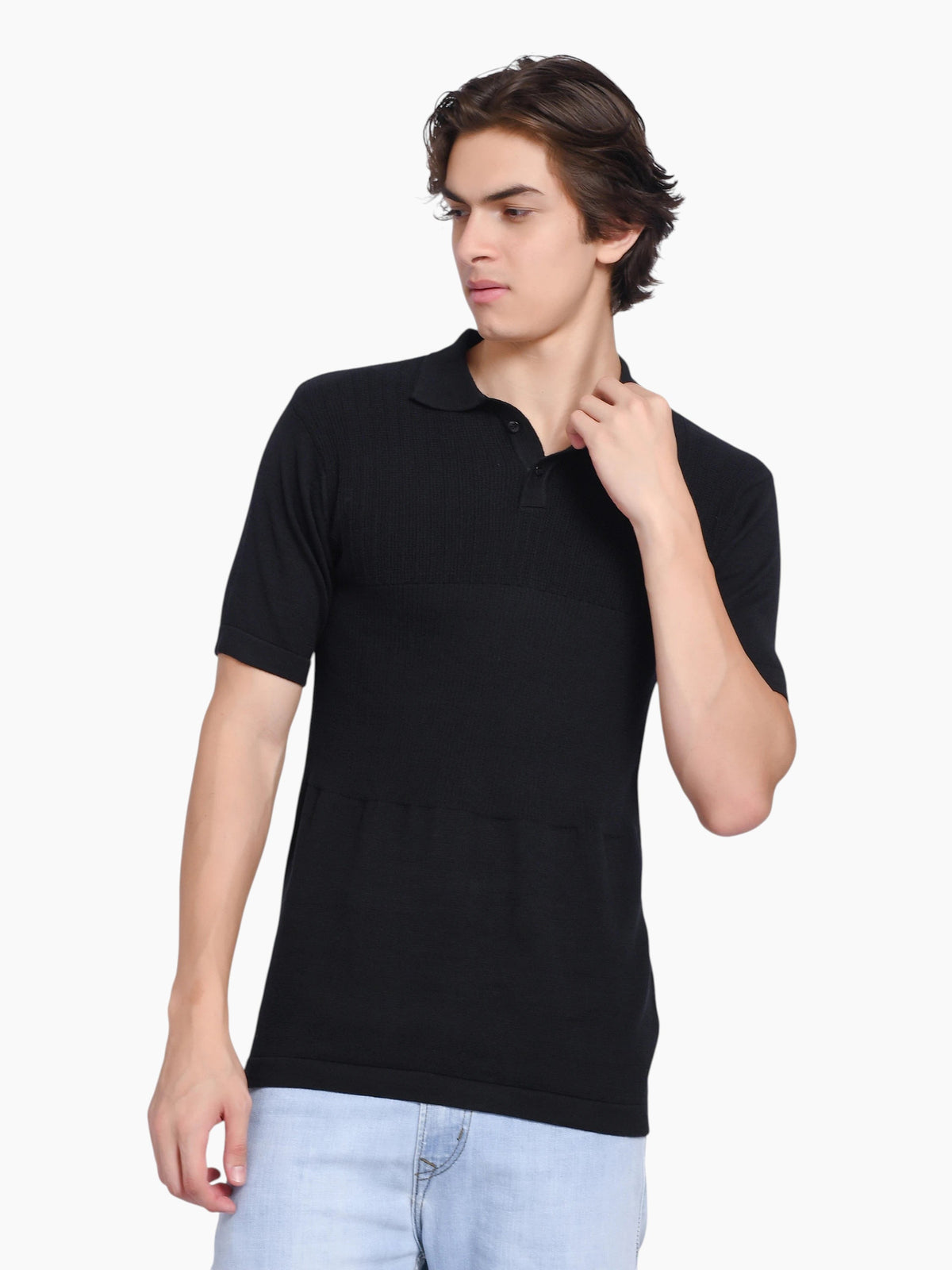 Model wearing an enaay.com black pure cotton knitted polo shirt with a classic collar and two-button placket.