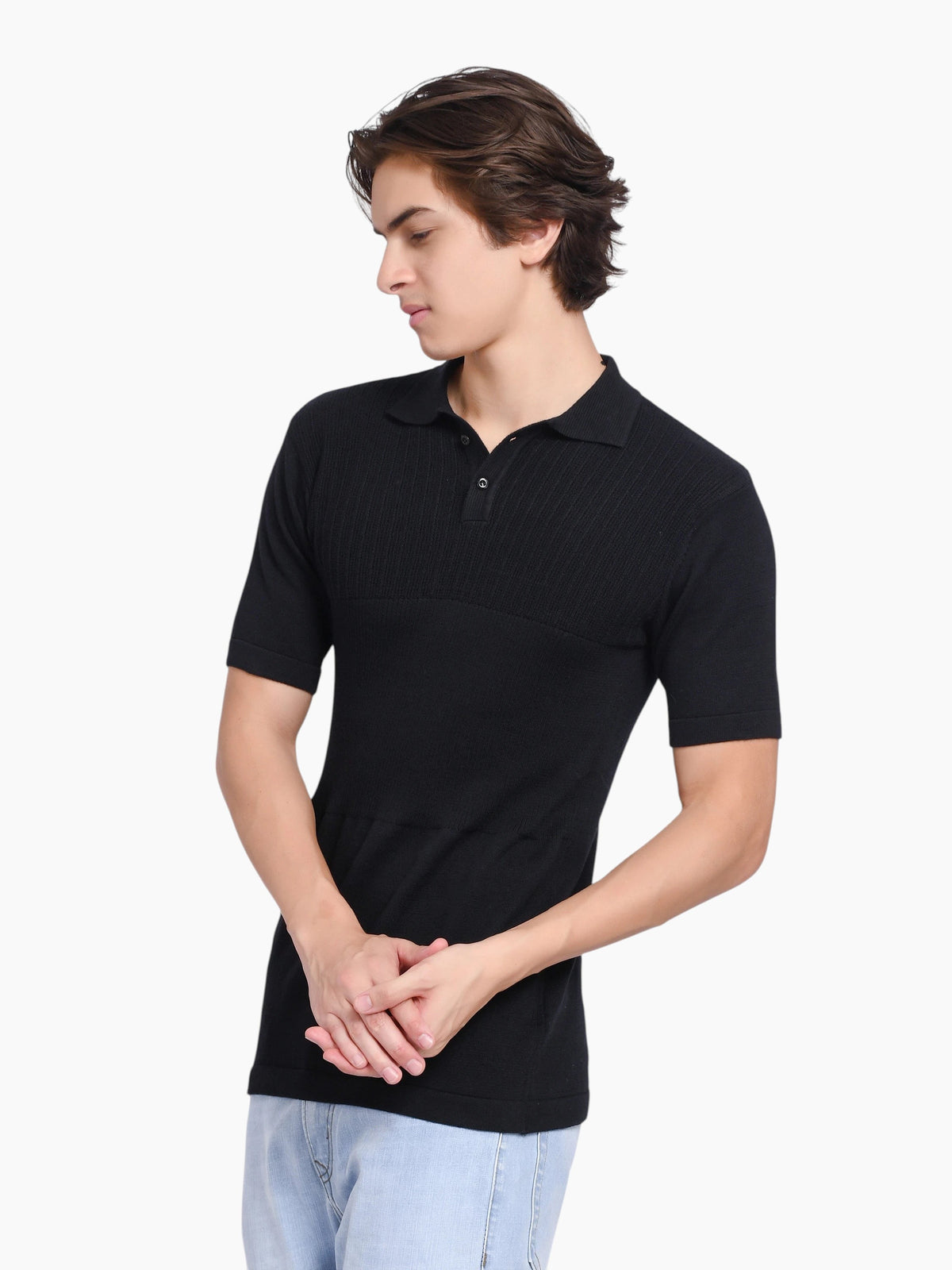 Model wearing an enaay.com black pure cotton knitted polo shirt with a classic collar and two-button placket