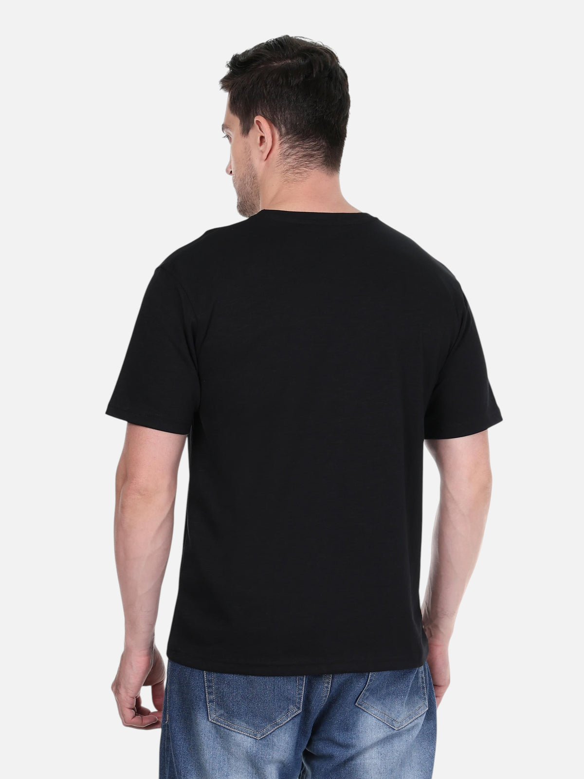 enaay.com men's black solid cotton round neck t-shirt viewed from the back, paired with blue denim jeans.