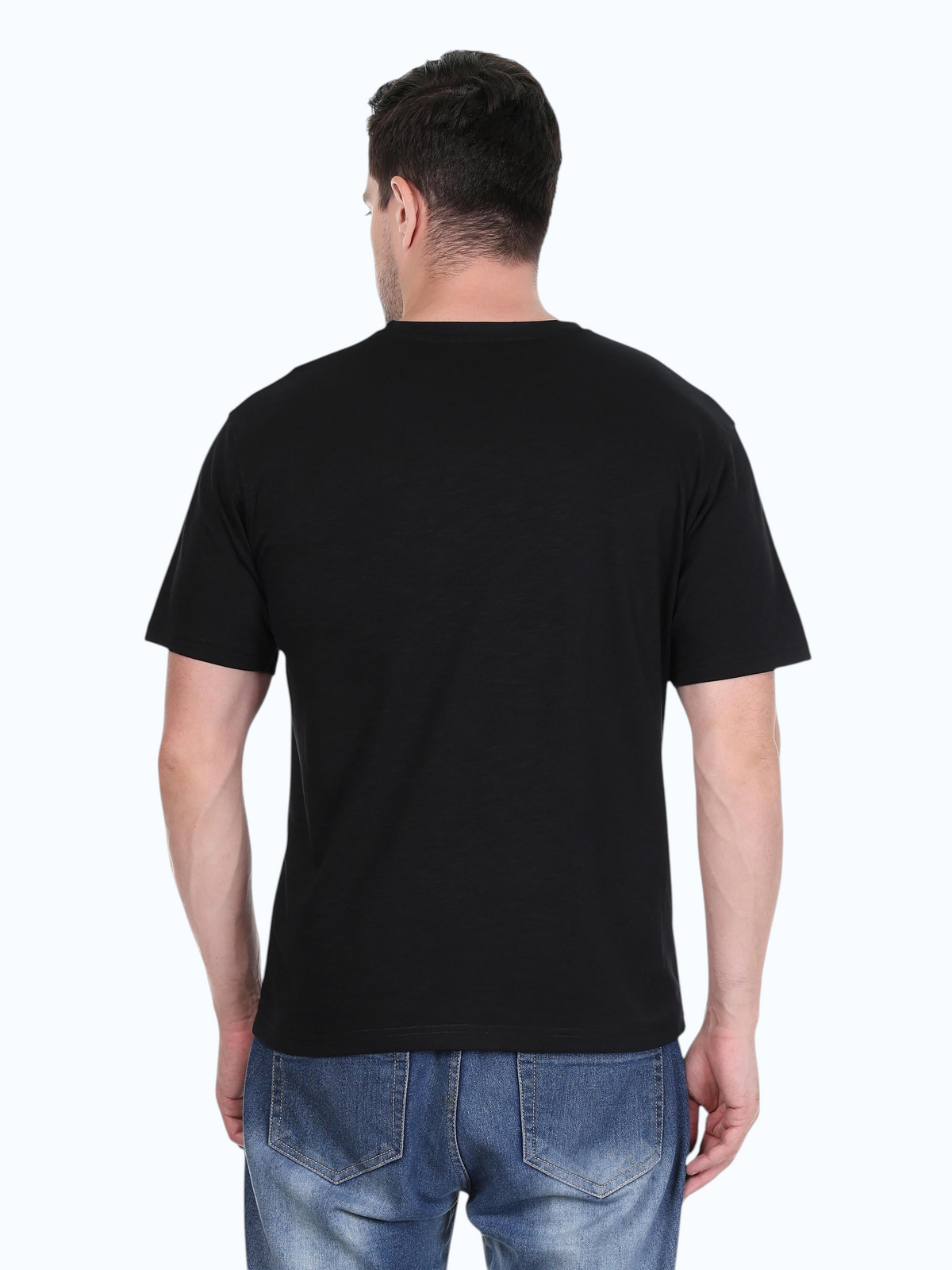 Back view of a man wearing a plain black enaay.com cotton crew neck t-shirt with short sleeves and regular fit.