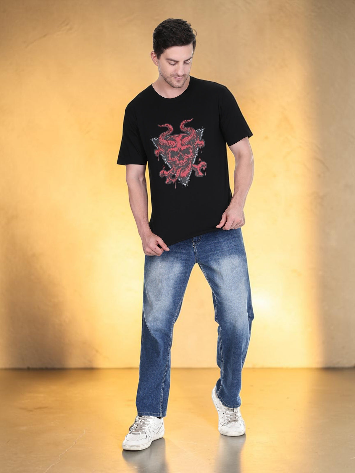 enaay.com black cotton t-shirt with red demon skull graphic print worn by a man with blue jeans and white sneakers