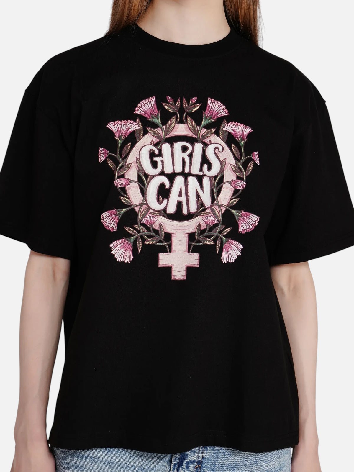 enaay.com black oversized cotton t-shirt featuring a pink floral Girls Can graphic print on the chest