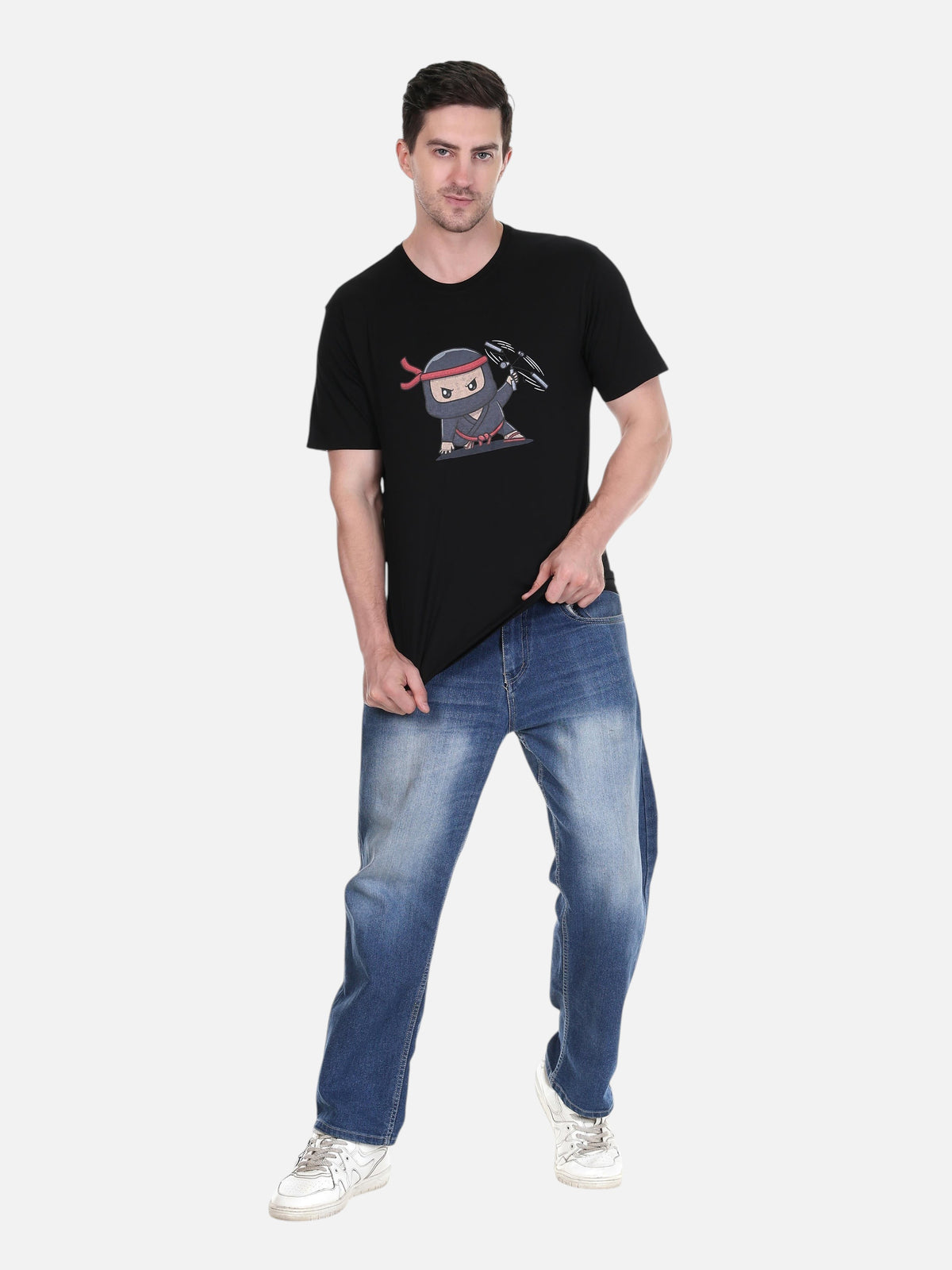 enaay.com men's black cotton round neck t-shirt featuring a cartoon ninja graphic print, worn with blue jeans.