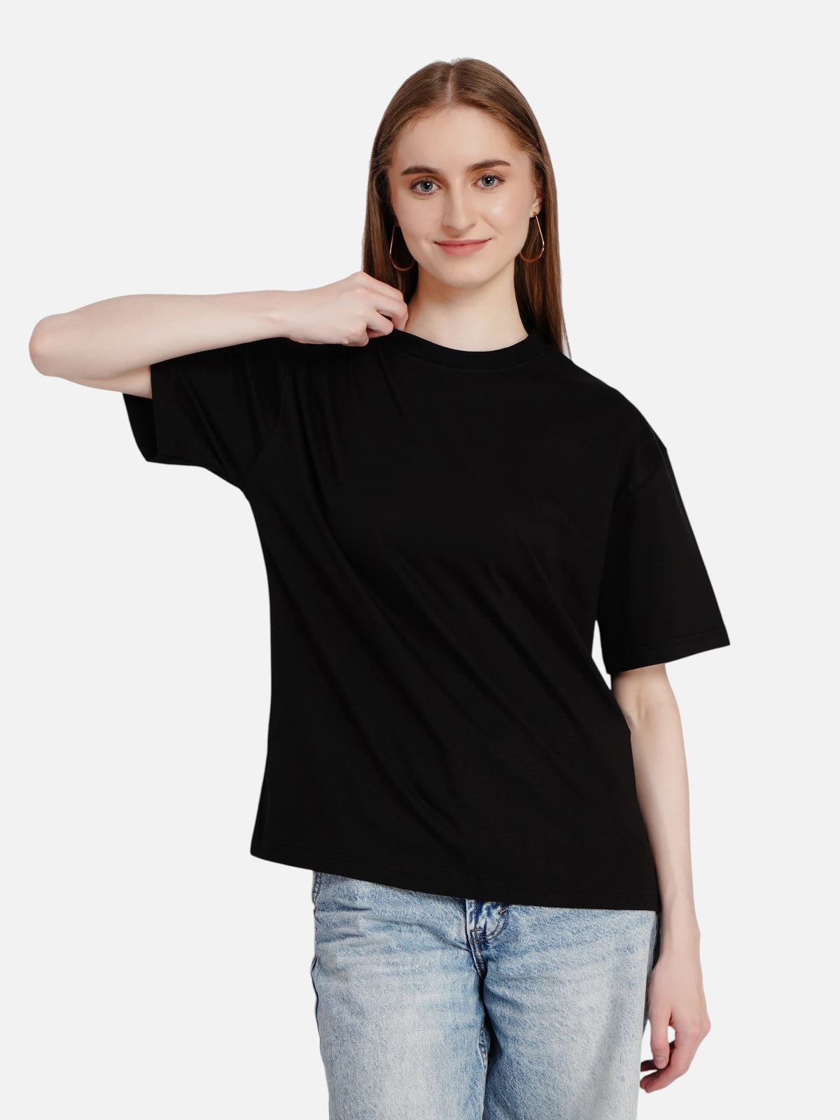 Model wearing an enaay.com black oversized premium cotton t-shirt with drop shoulders and a relaxed fit.