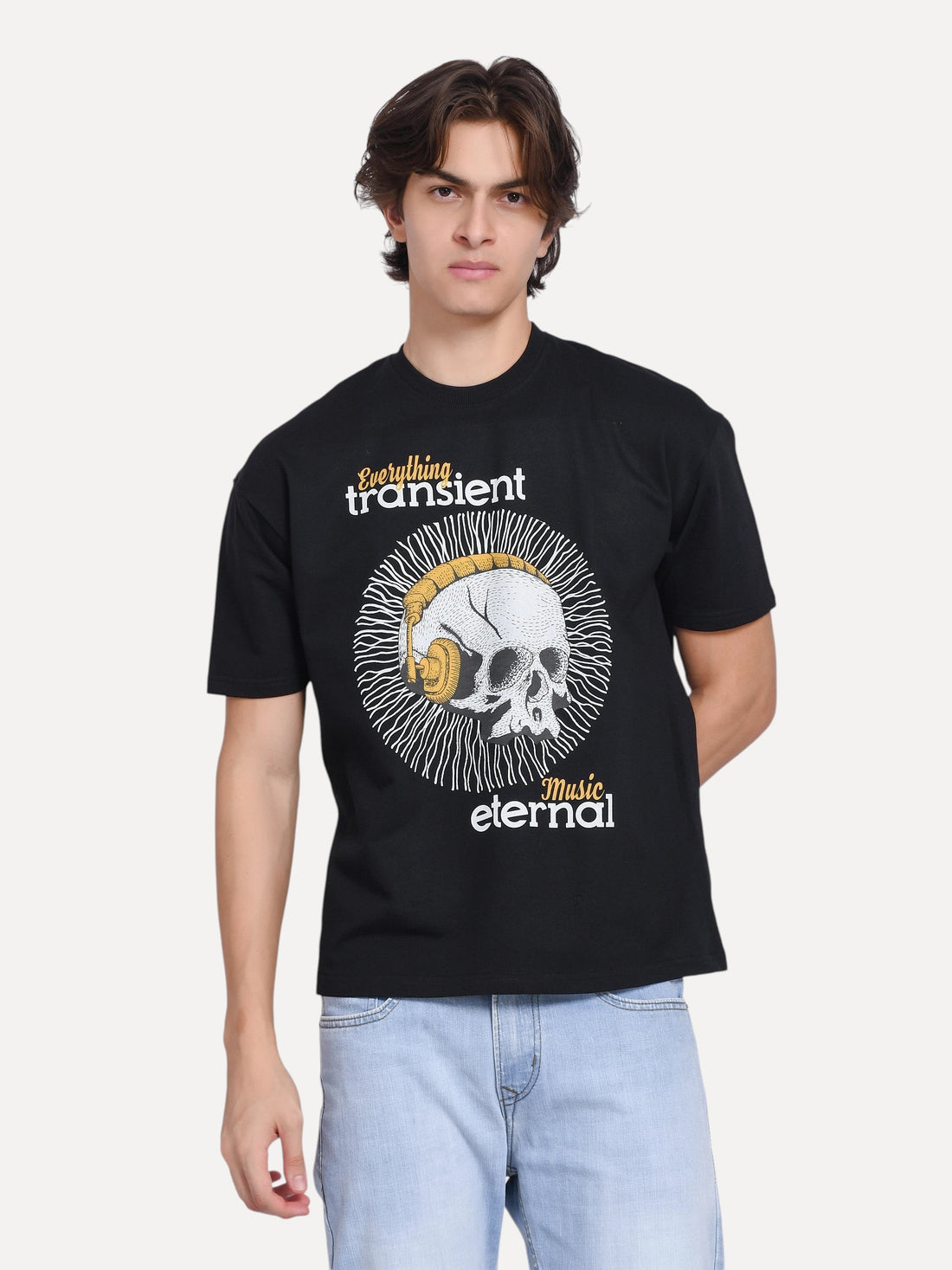 enaay.com men's black oversized crew-neck t-shirt featuring a skull with gold headphones graphic print