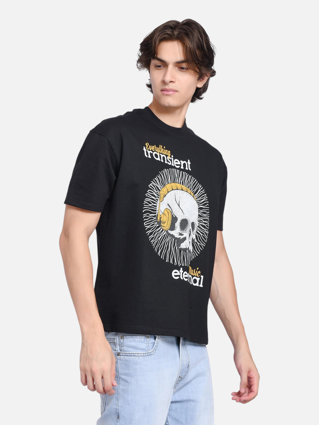 enaay.com men's black oversized crew-neck t-shirt featuring a skull with gold headphones graphic print