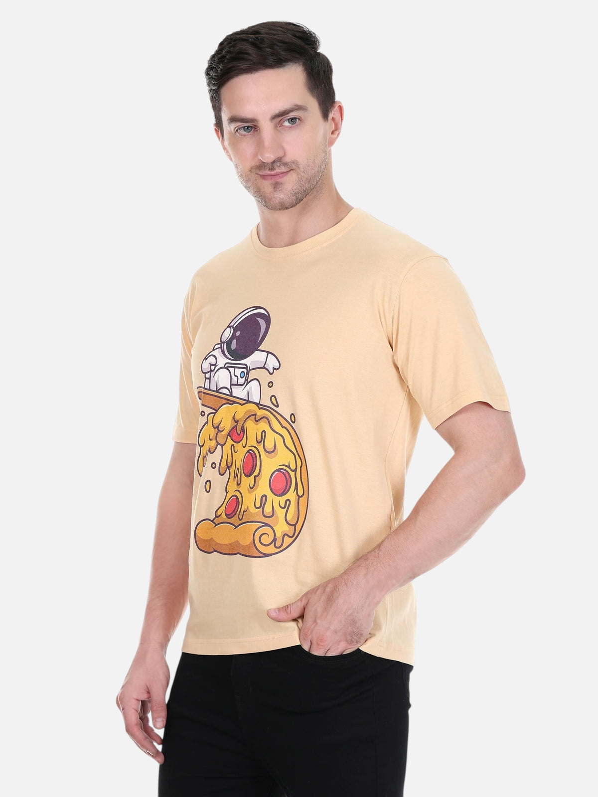 A man wearing an enaay.com camel cotton t-shirt featuring a graphic print of an astronaut surfing on a pizza slice.