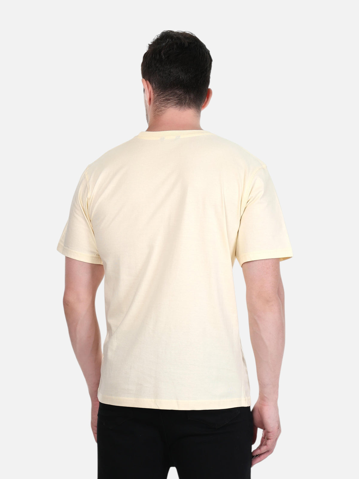 Back view of a man wearing an enaay.com cream premium cotton crew neck t-shirt with short sleeves.