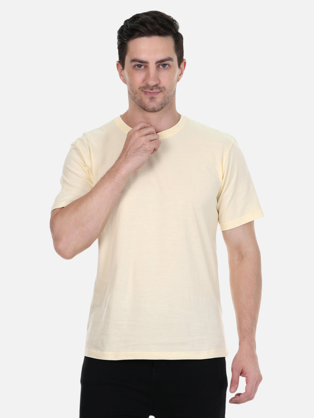 A model wearing an enaay.com cream premium cotton round neck t-shirt with a regular fit against a white background.