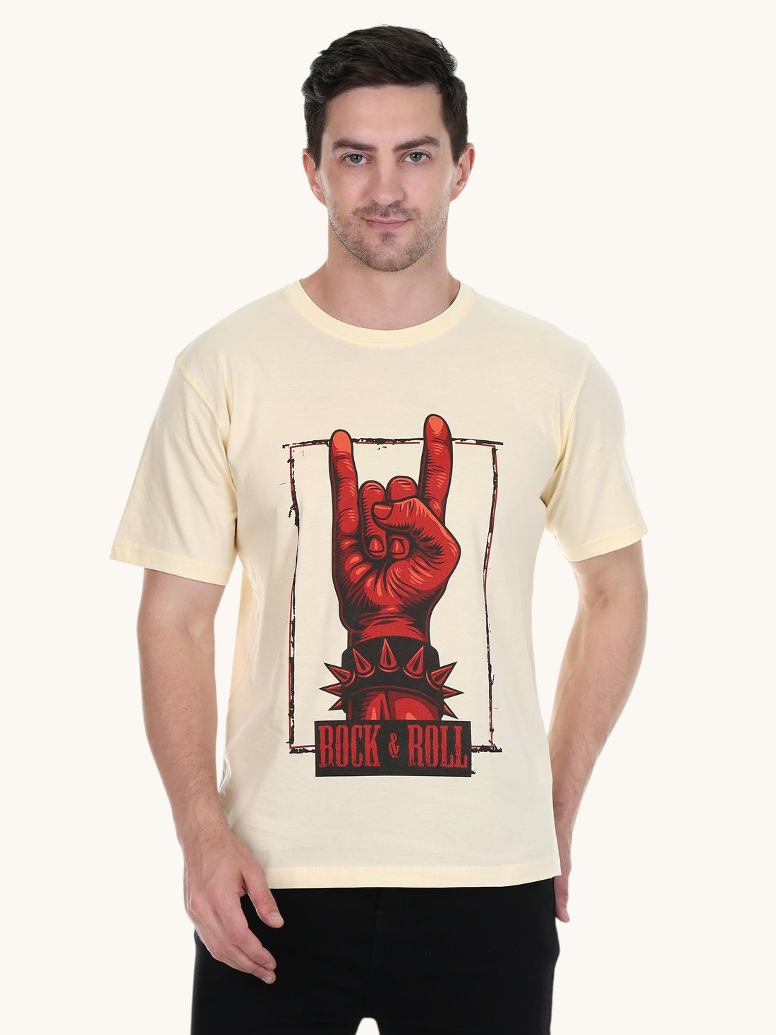 Model wearing an enaay.com cream cotton t-shirt with a red rock and roll hand gesture graphic print