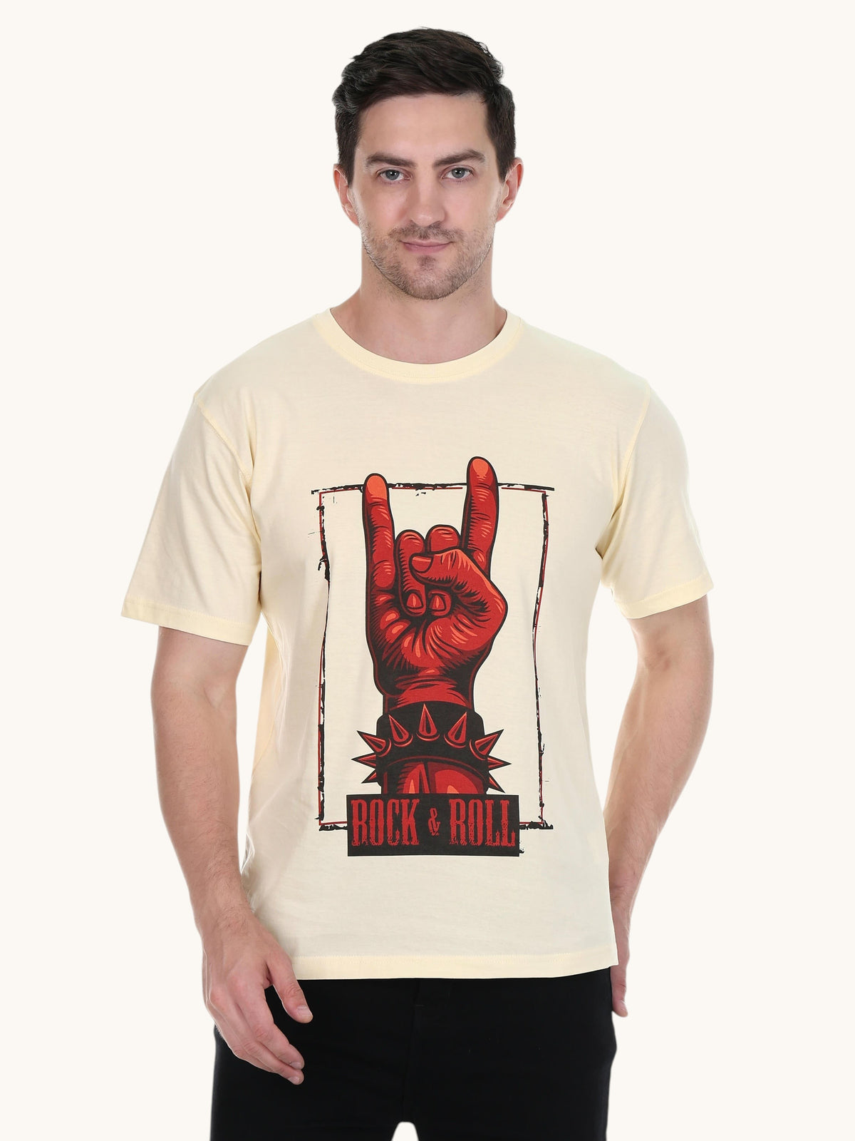 Model wearing an enaay.com cream cotton t-shirt with a red rock and roll hand gesture graphic print