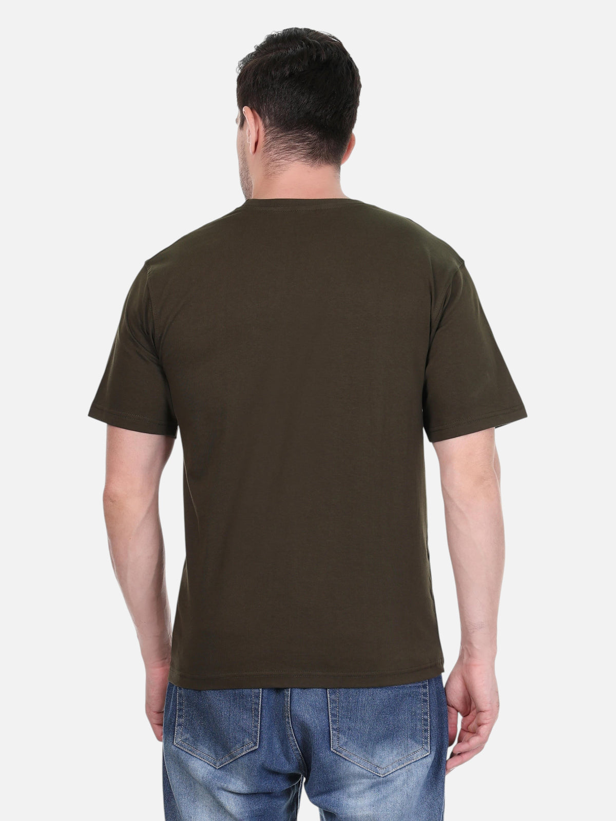 Back view of a man wearing an enaay.com dark green premium cotton round neck t-shirt with blue denim jeans.