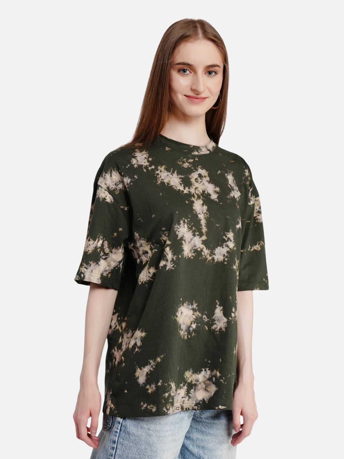 Model wearing an enaay.com dark green oversized cotton t-shirt with a unique bleached acid wash tie-dye pattern.
