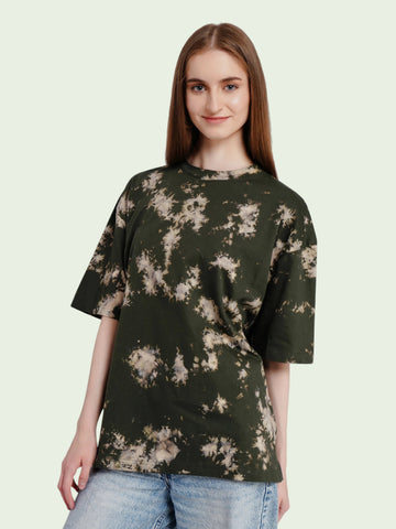 Model wearing an enaay.com dark green oversized cotton t-shirt with a unique bleached acid wash tie-dye pattern.