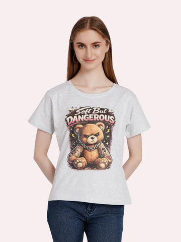 Model wearing an enaay.com grey melange cotton t-shirt with a grumpy tattooed teddy bear graphic print.