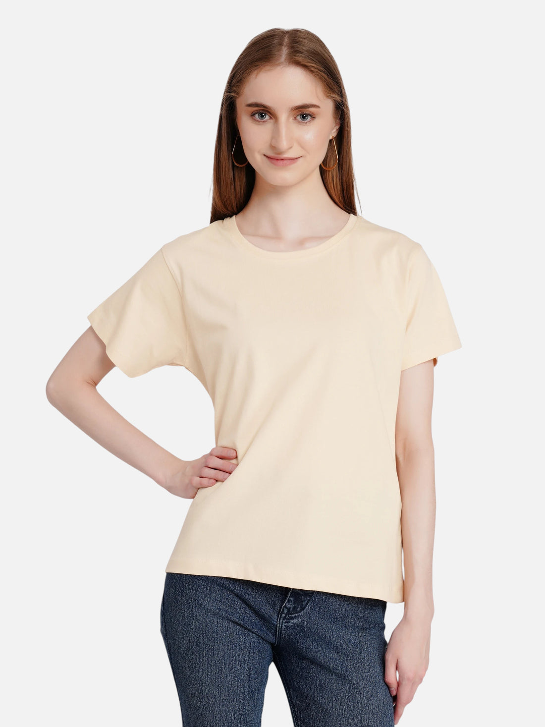 Model wearing an enaay.com light beige premium cotton round neck t-shirt with short sleeves and a regular fit.