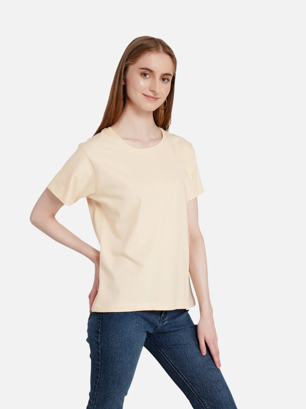 Model wearing an enaay.com light beige regular fit cotton t-shirt with short sleeves and a round neck