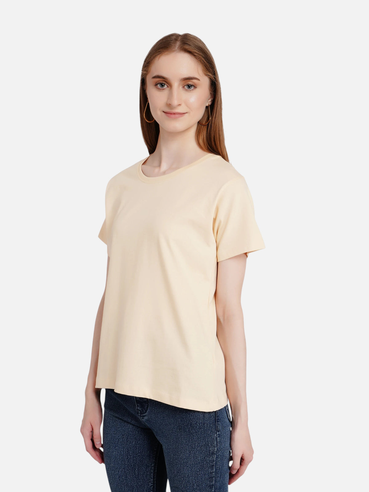 A model wearing an enaay.com light beige regular fit cotton t-shirt with a round neck and short sleeves.