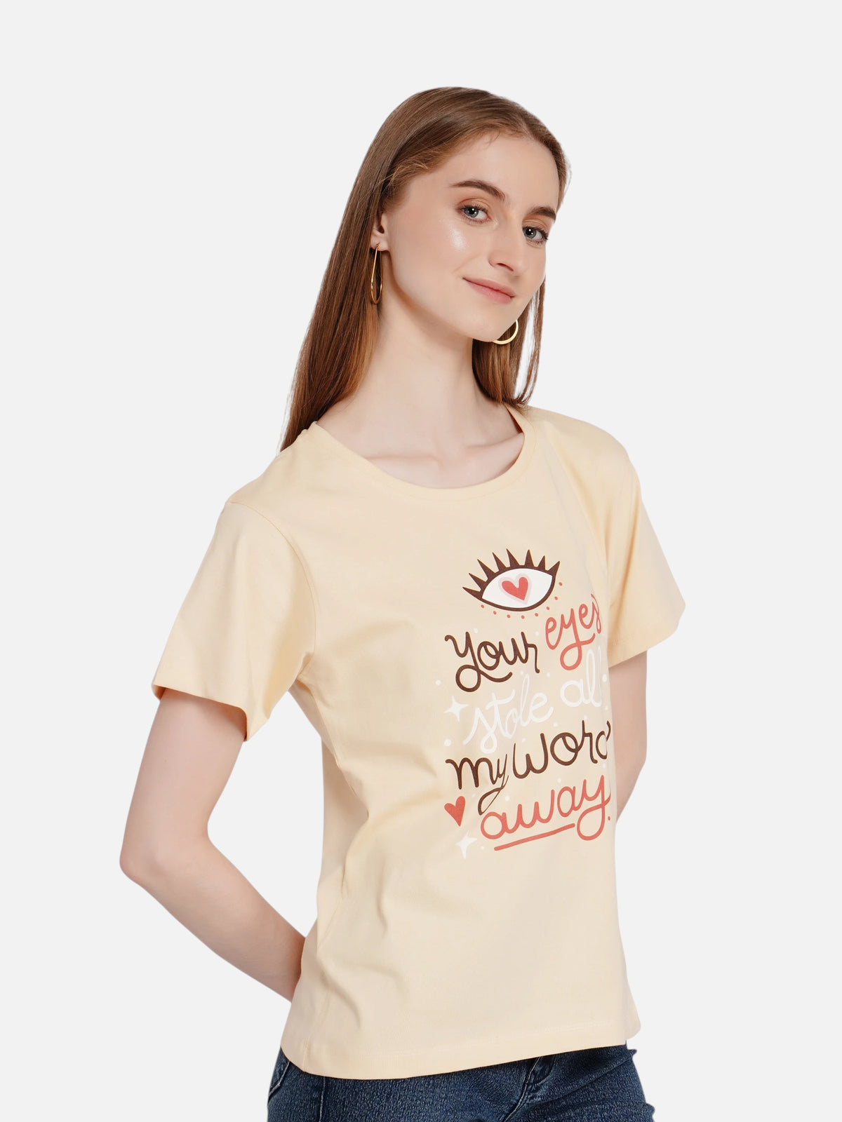 enaay.com light beige cotton t-shirt with romantic eye graphic and hand-lettered text worn by a woman