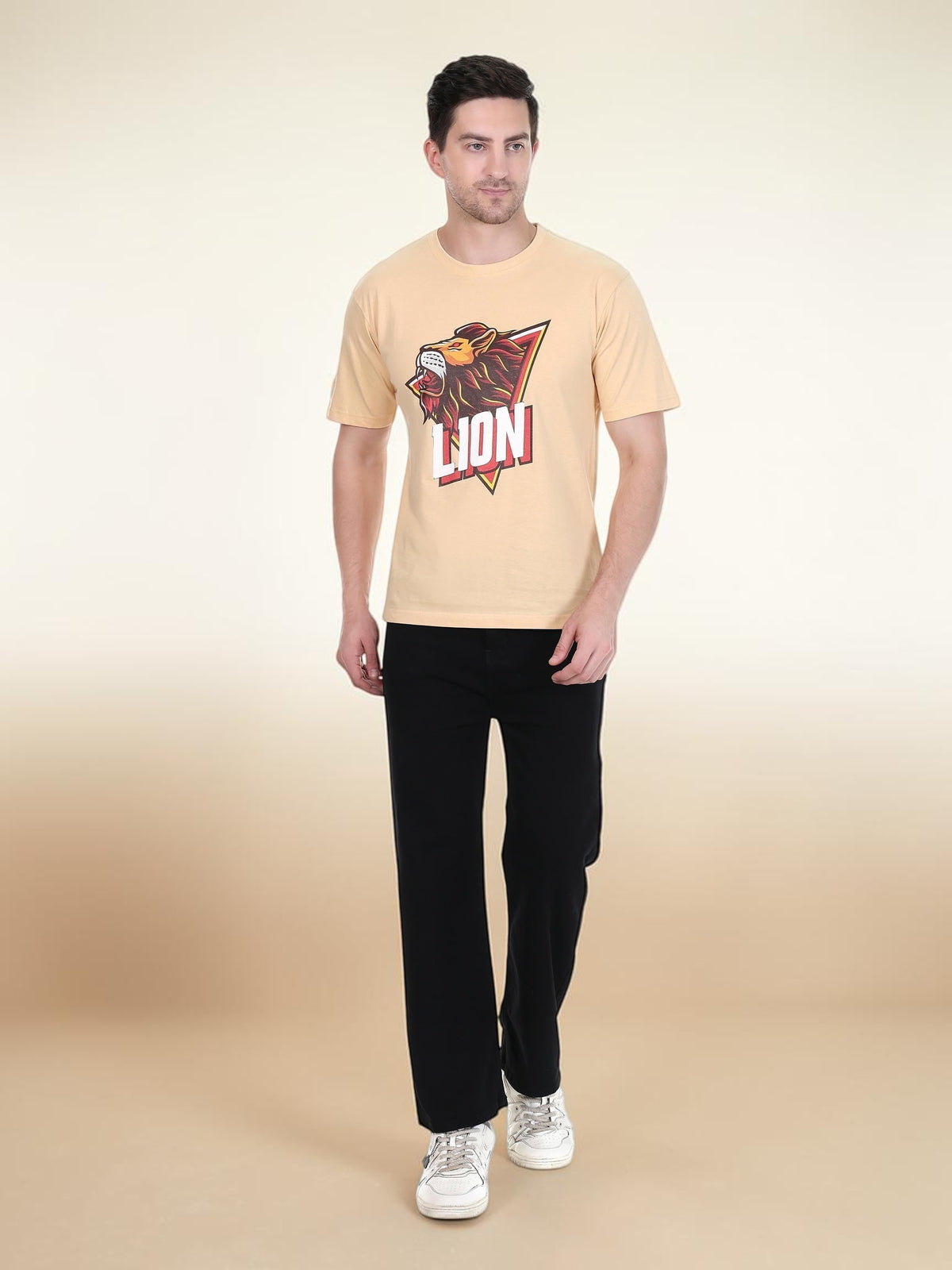 A man wearing an enaay.com light beige premium cotton t-shirt with a roaring lion graphic print and round neck.