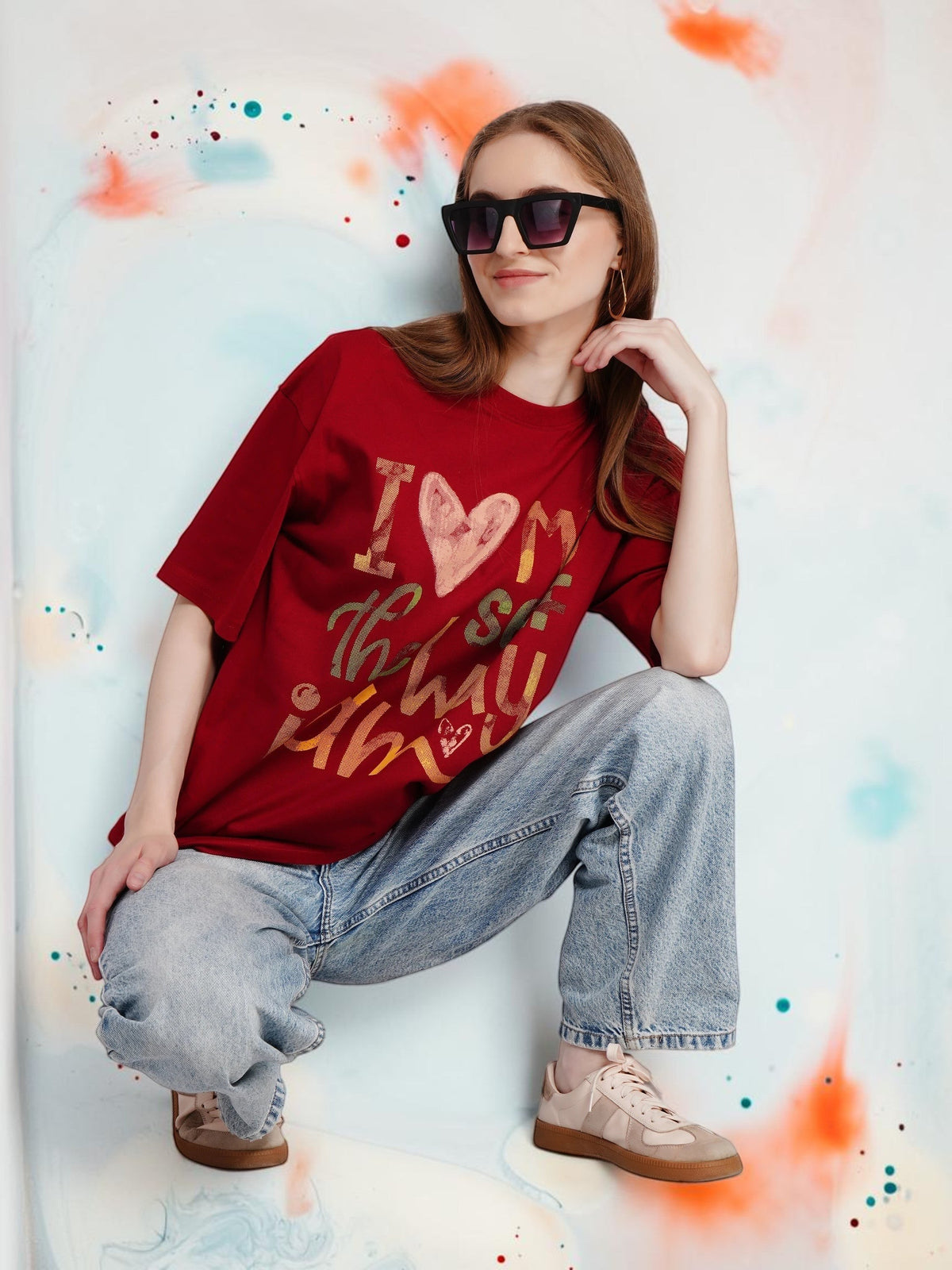 Model wearing an enaay.com maroon cotton graphic t-shirt with I Love Myself The Way I Am text and denim jeans