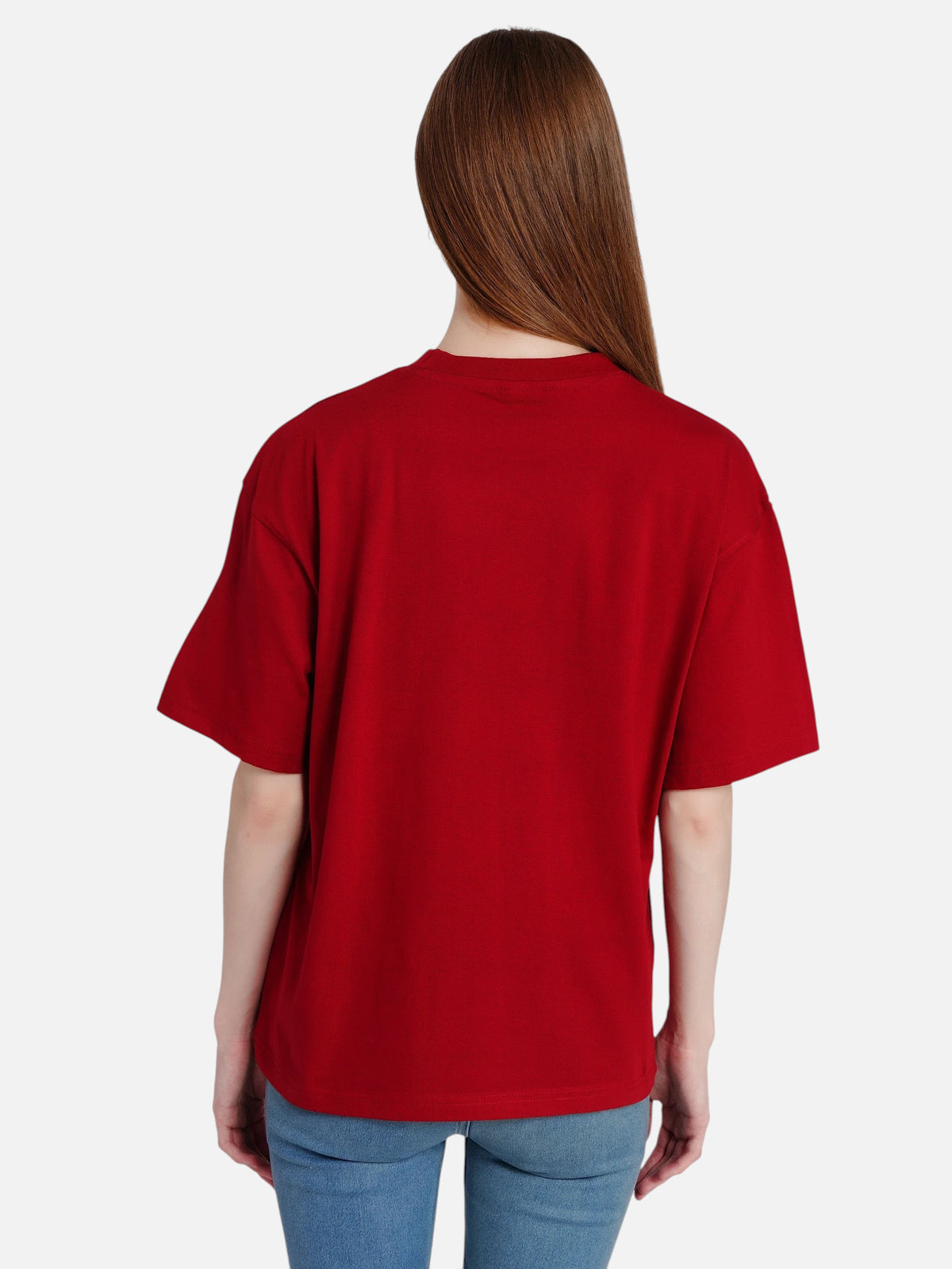 Back view of a woman wearing an enaay.com maroon oversized premium cotton t-shirt with a round neck.