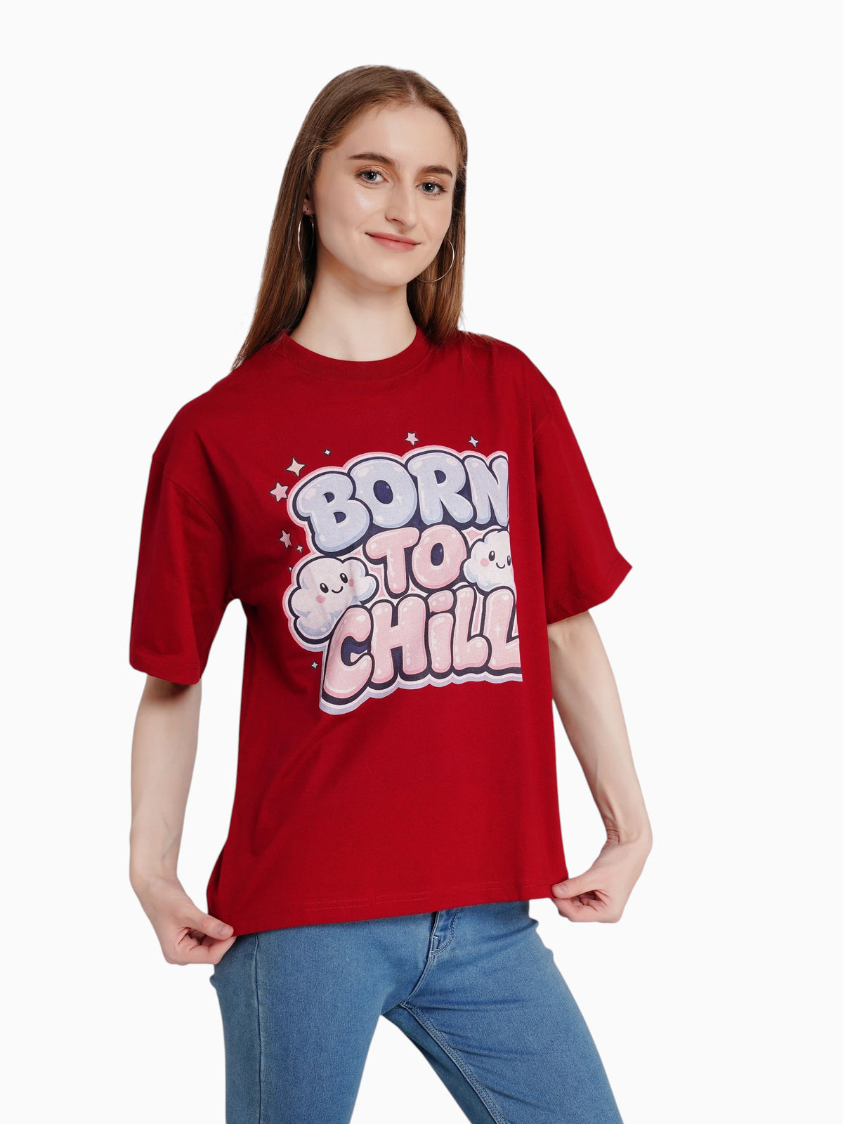 Model wearing an enaay.com maroon oversized cotton t-shirt with Born To Chill graphic and cute cloud characters
