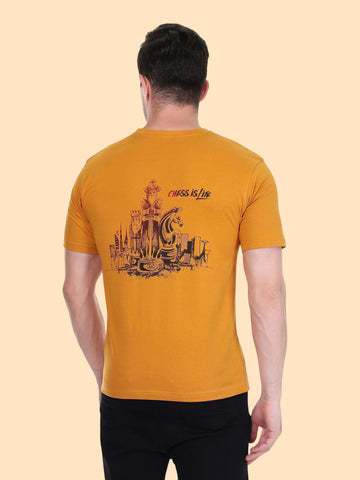 Back view of an enaay.com mustard yellow slim fit t-shirt featuring a Chess Is Life graphic print with a cityscape.