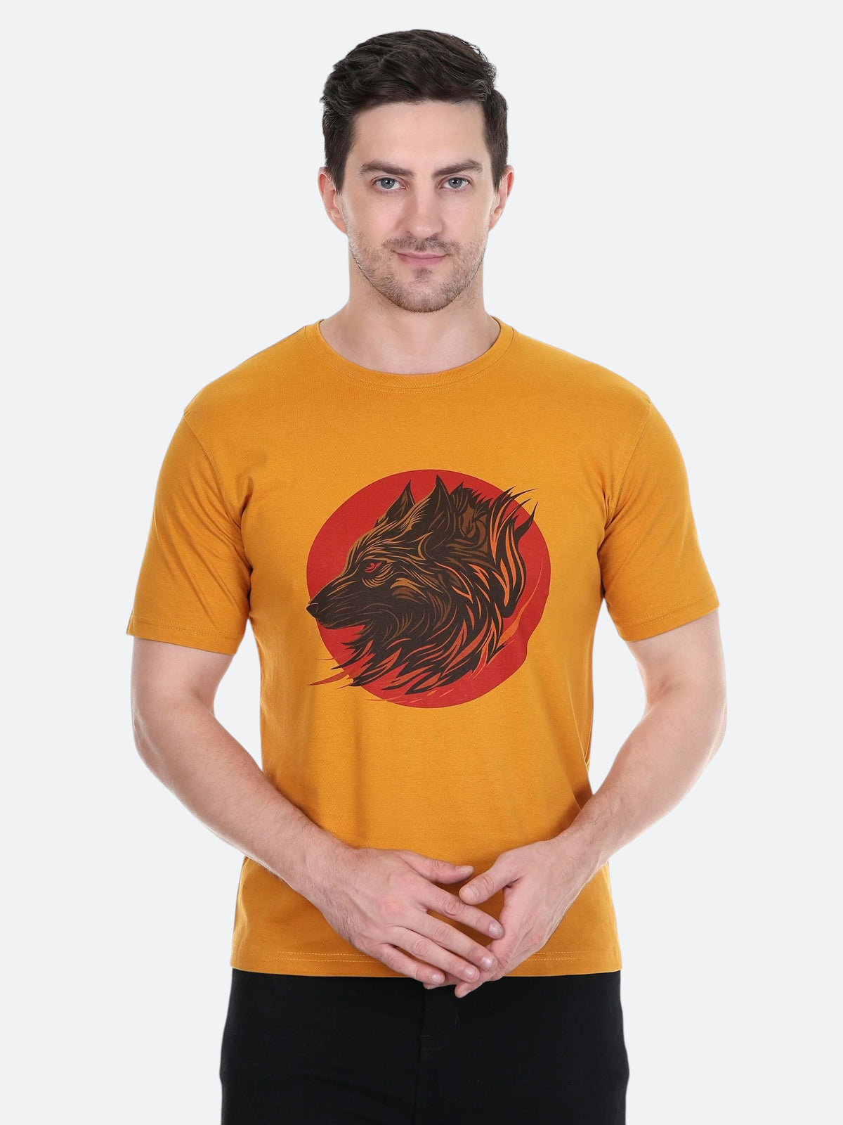 A man wearing an enaay.com mustard yellow round neck t-shirt featuring a dark wolf graphic on a red circular background.