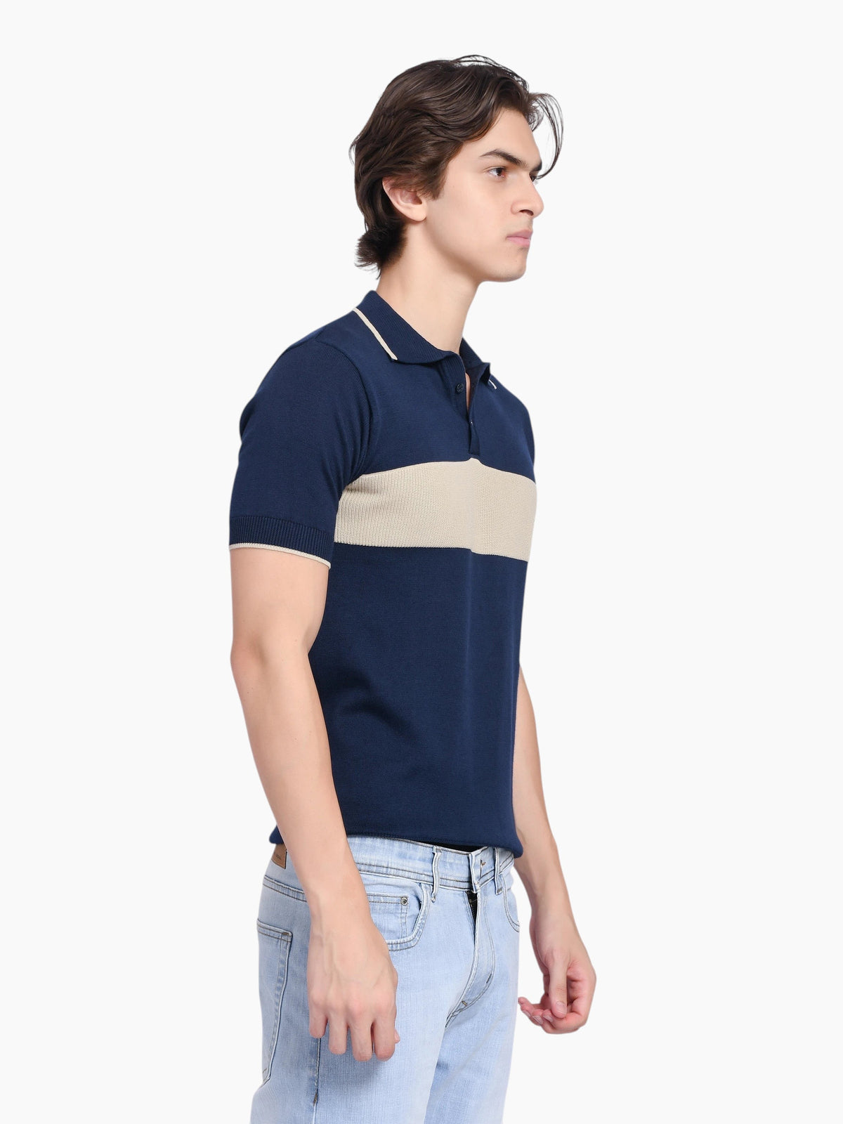 enaay.com men's navy blue cotton knit polo with a beige chest stripe, tipped collar, and ribbed cuffs on a model