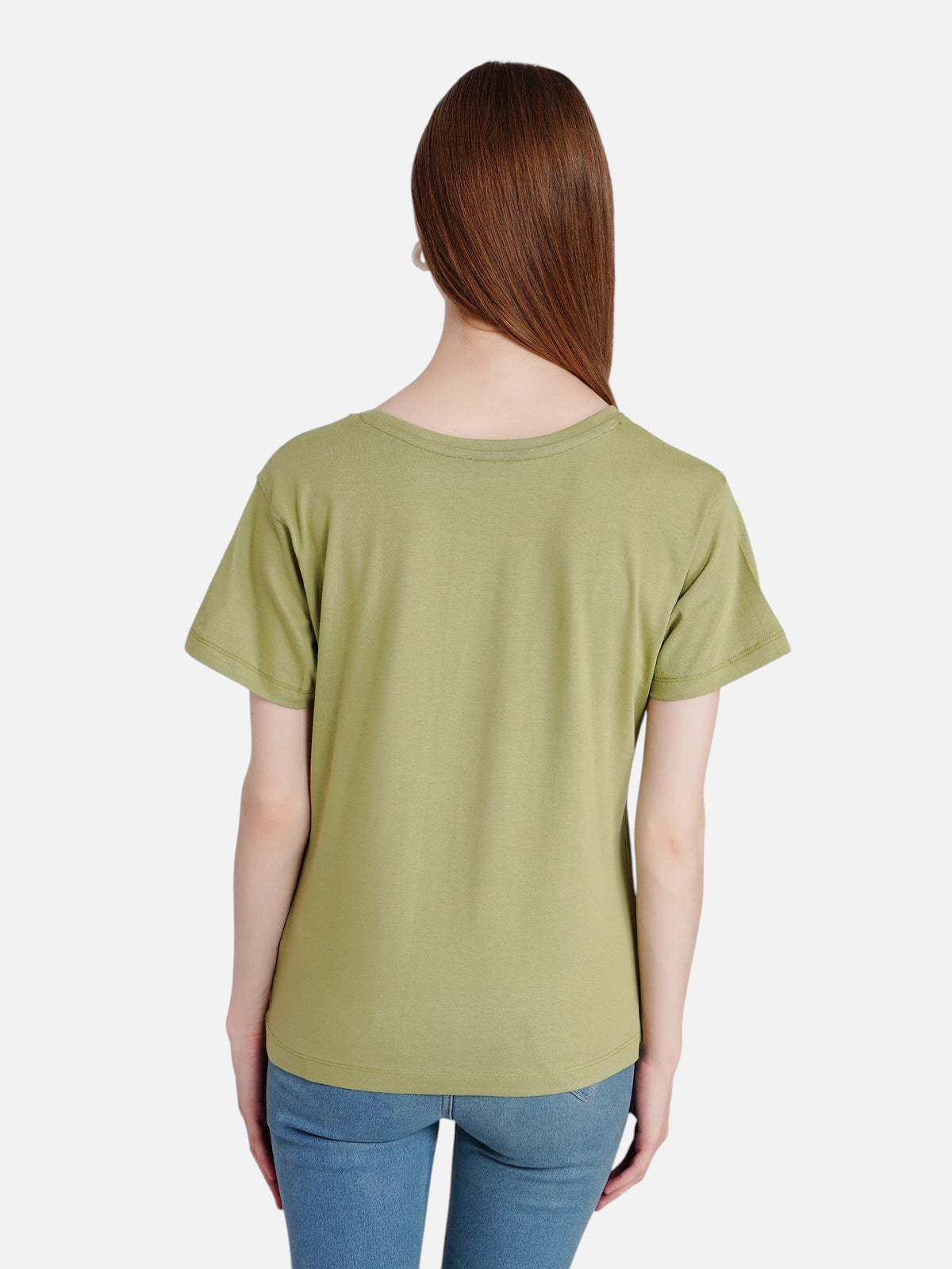 Back view of a woman wearing an olive green enaay.com crew neck cotton t-shirt with short sleeves and a relaxed fit.