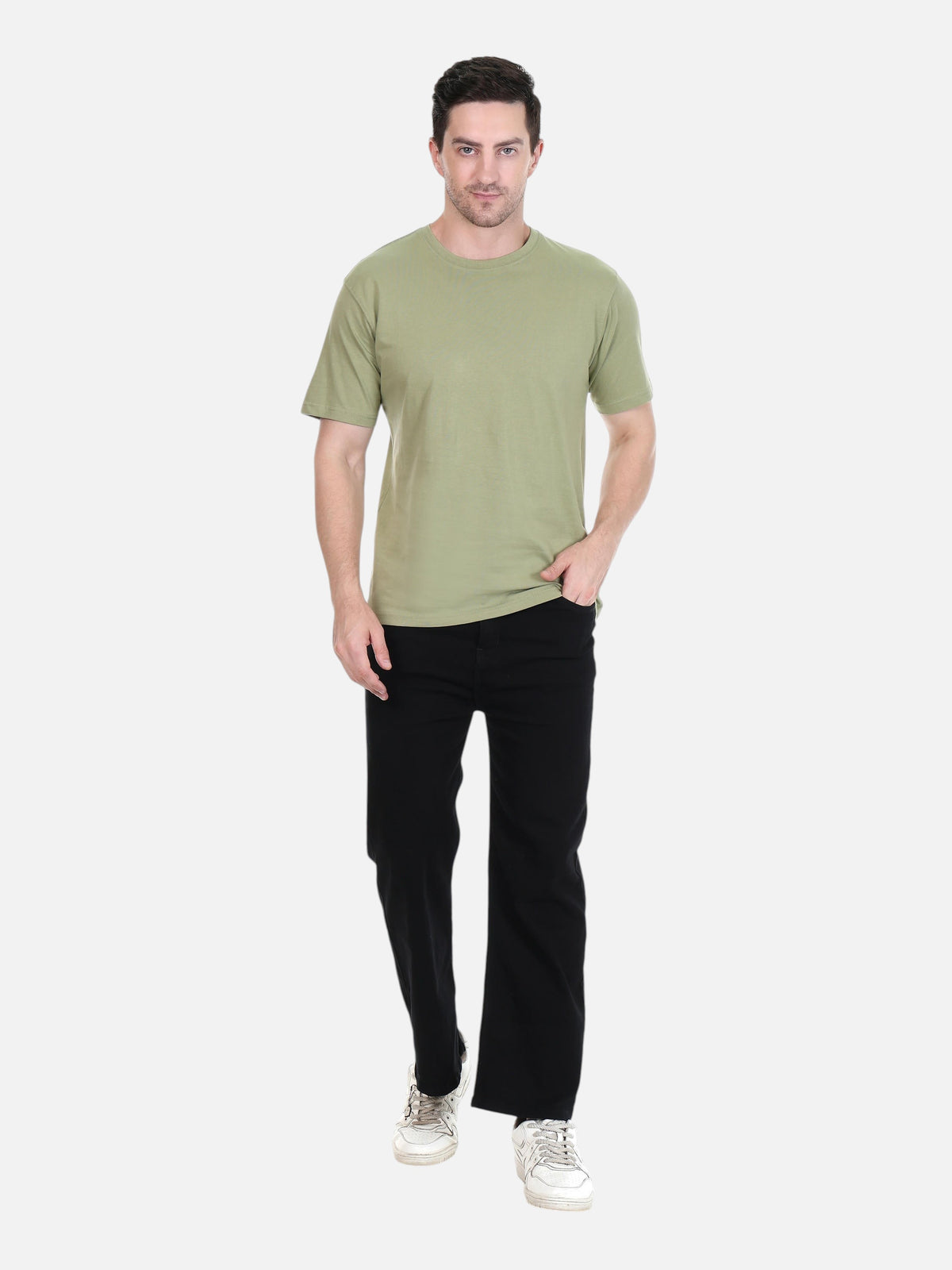 Model wearing an enaay.com olive green round neck premium cotton t-shirt with black trousers and white sneakers