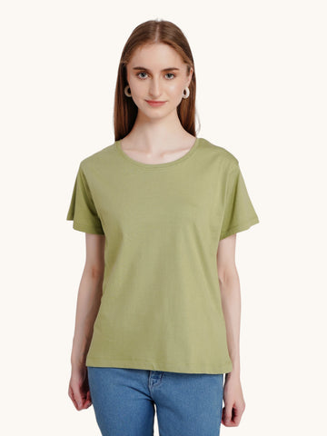 Model wearing an enaay.com olive green premium cotton round neck short sleeve t-shirt with blue jeans
