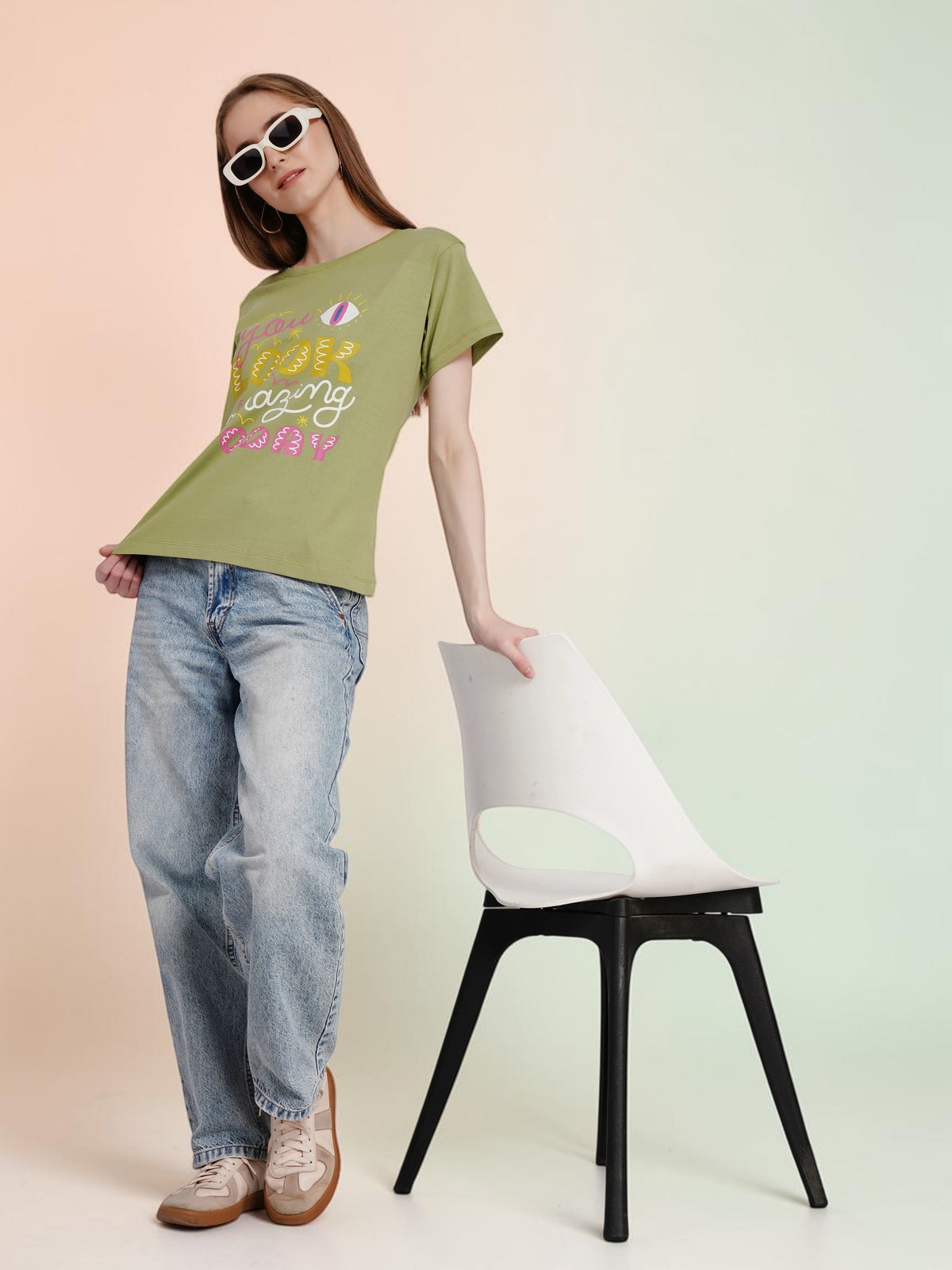 enaay.com olive green graphic t-shirt with You Look Amazing Today print worn by a model with white sunglasses