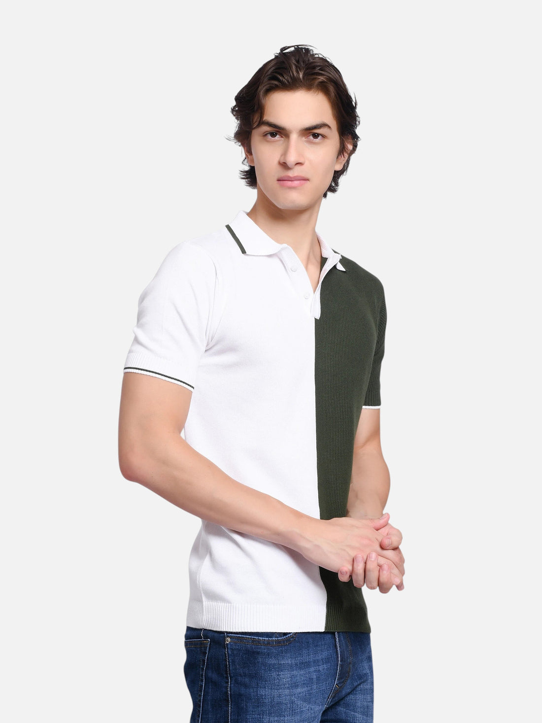 Model wearing an enaay.com olive green and white colour-block knitted polo shirt with a classic collar and button front