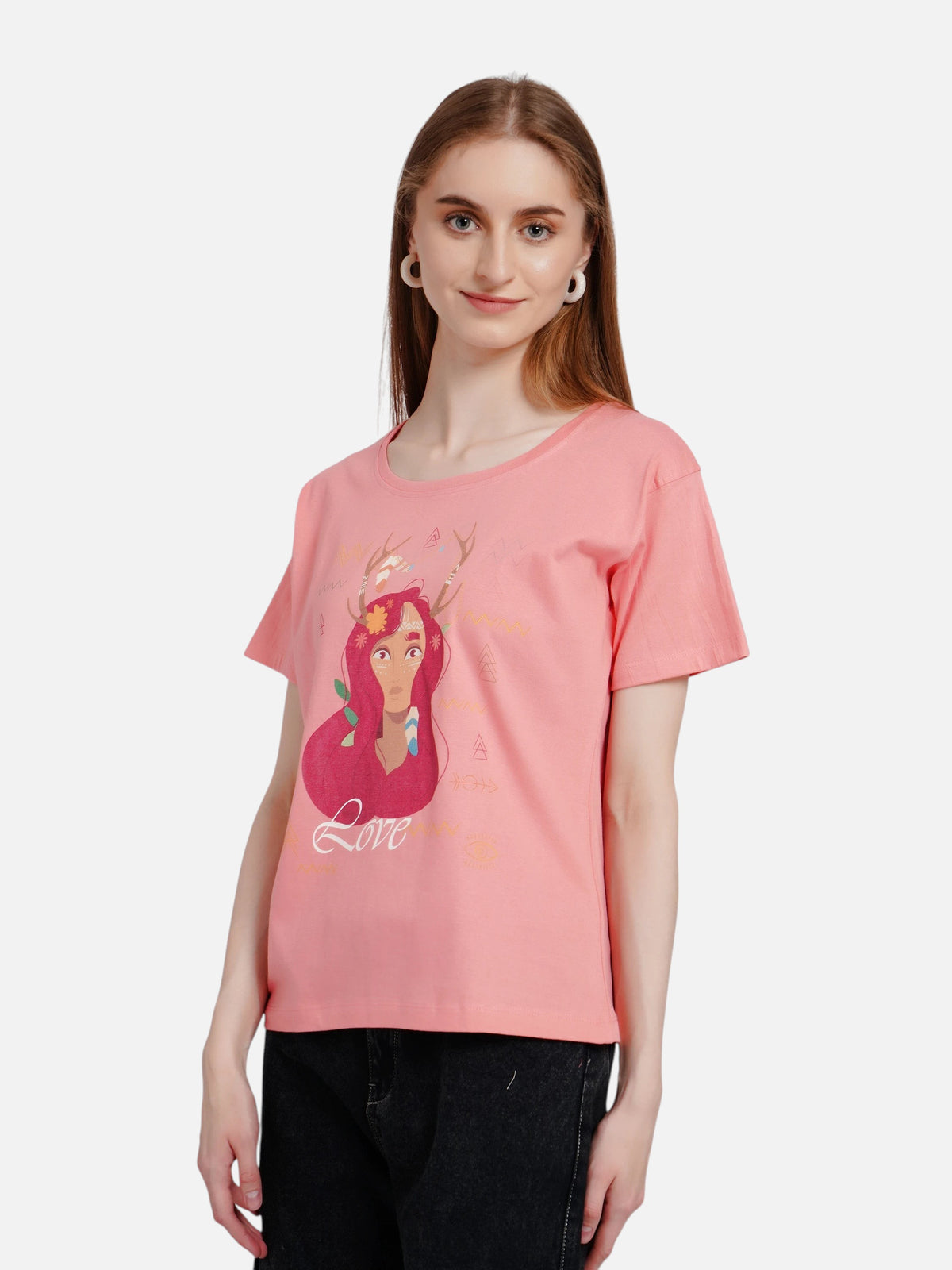 Model wearing an enaay.com peach pink cotton round neck t-shirt with a boho girl Love graphic print.