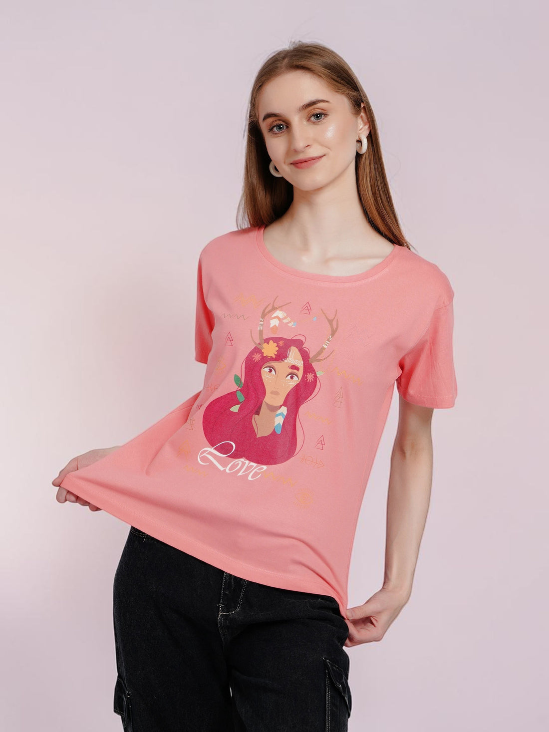 Model wearing an enaay.com peach pink round neck cotton t-shirt with a boho girl Love graphic print