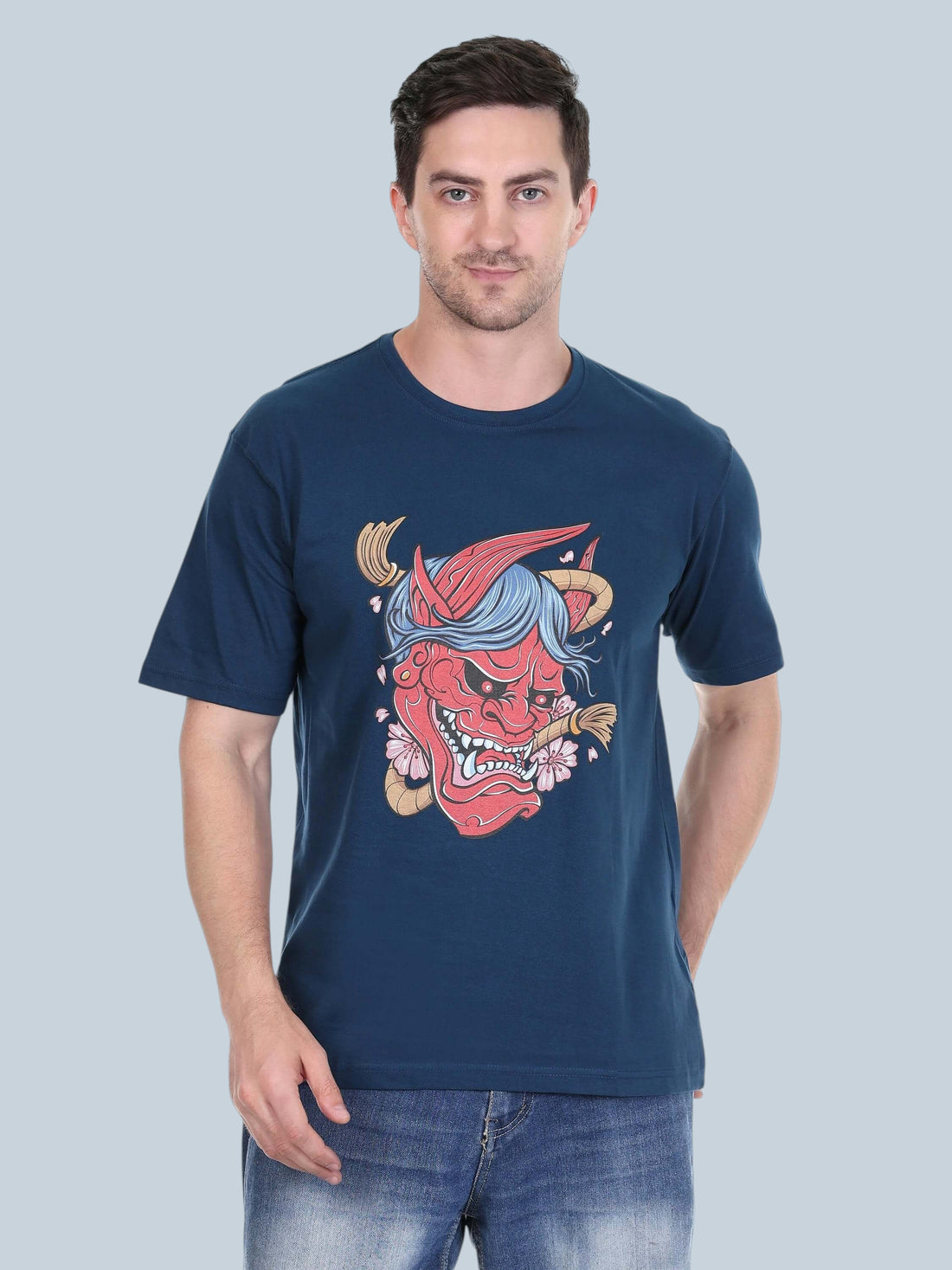 Model wearing an enaay.com petrol blue cotton t-shirt with a red Japanese Oni demon mask and cherry blossom graphic