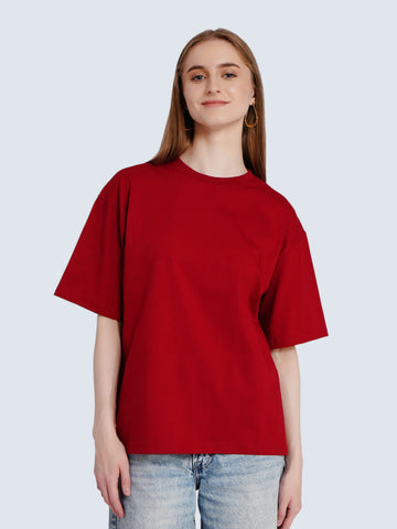Model wearing an enaay.com red oversized premium cotton t-shirt with a solid design and relaxed fit