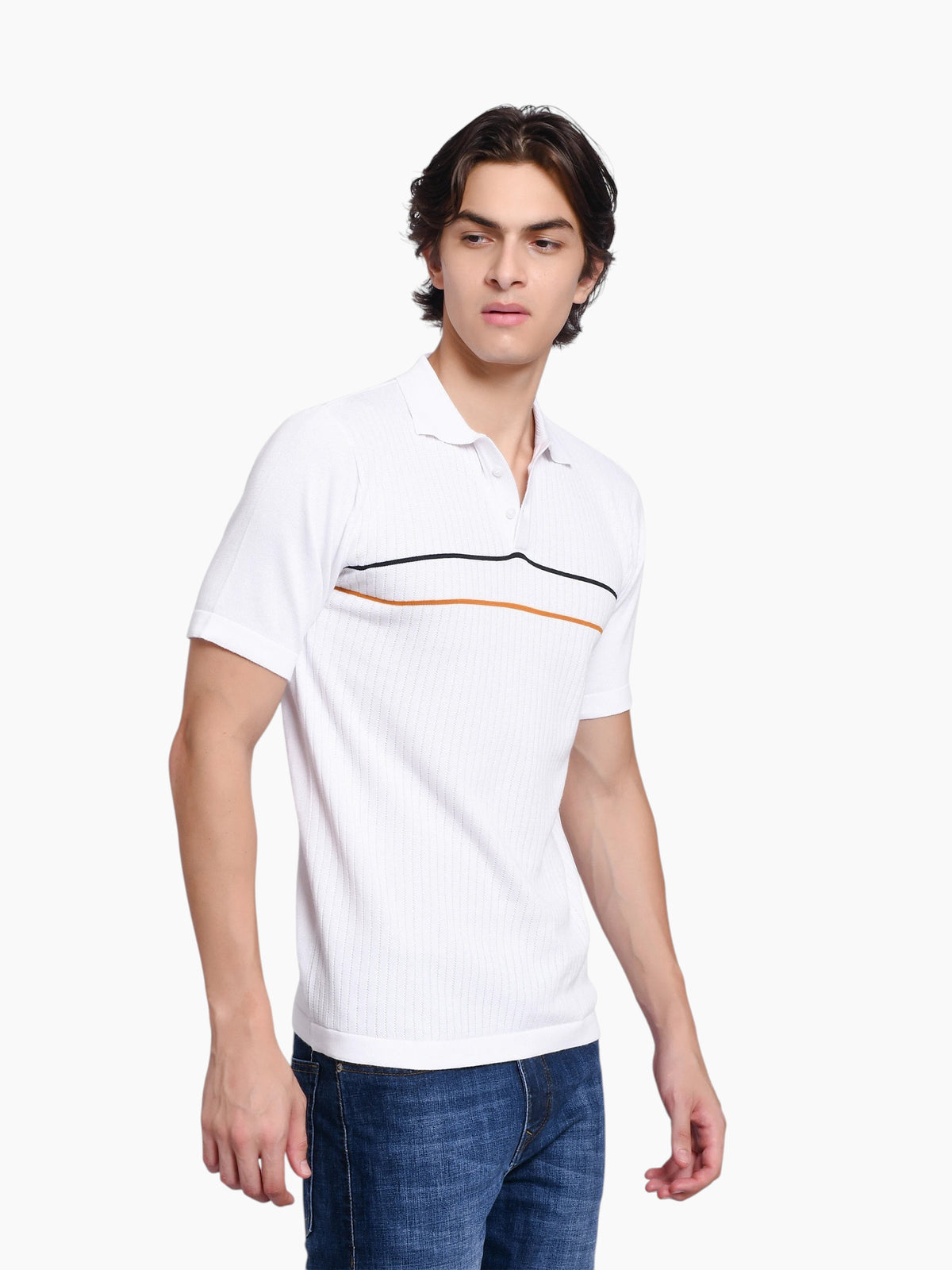 Model wearing an enaay.com white knit polo shirt with black and orange chest stripes and a classic collar
